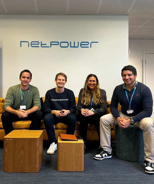 Member of Parliament Aleksander Stokkebø on the sofa at Netpower, together with Netpower employees